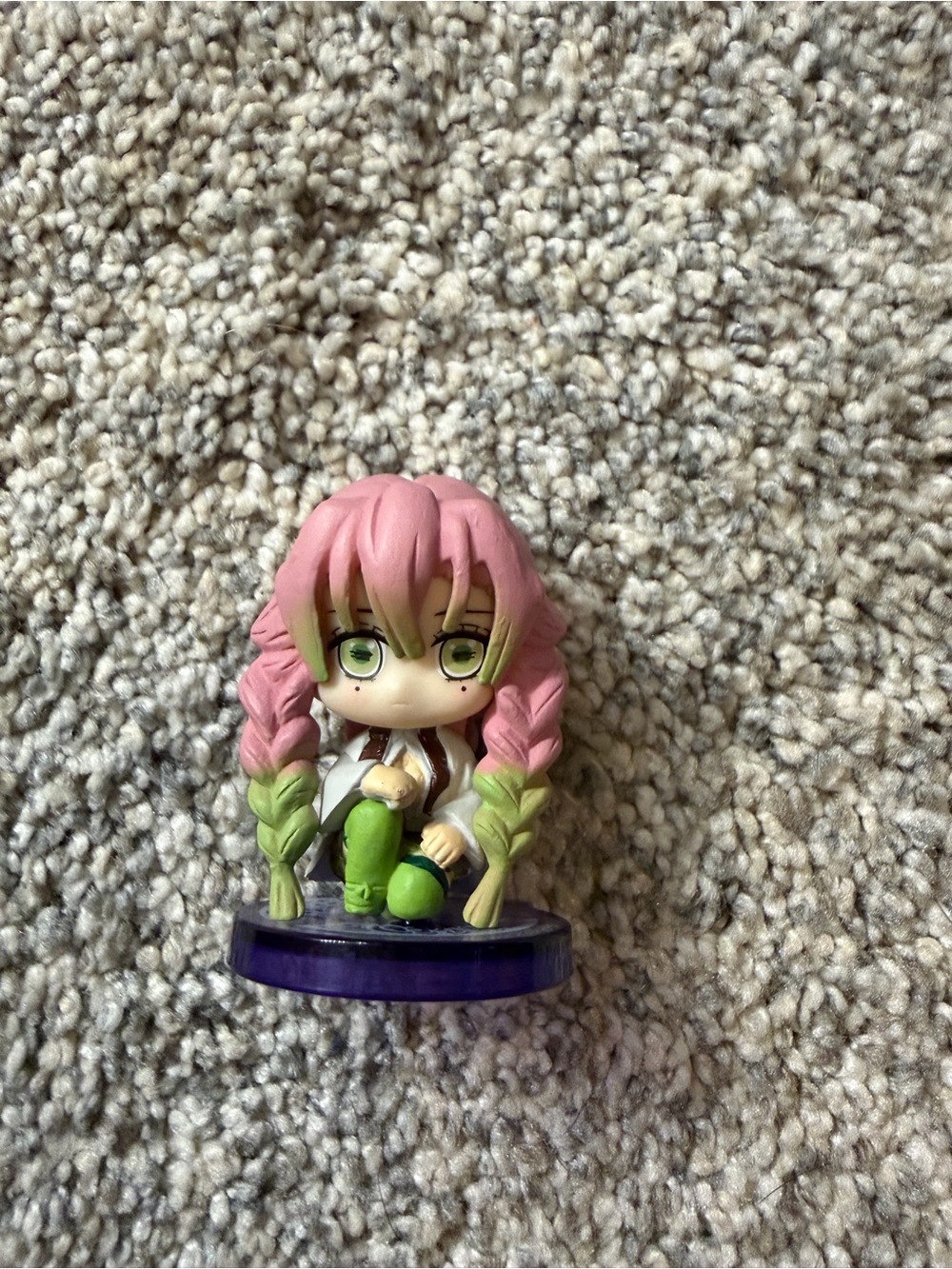 Pink & Green Anime-Style Chibi Figure on Display Base